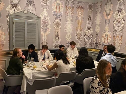 A small group of students around a table