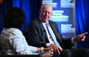David Solomon on stage with Reena Aggarwal at FMQ