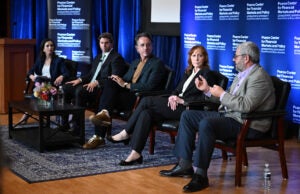 Four panelists on stage