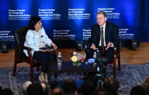 Paul Atkins on stage with Reena Aggarwal