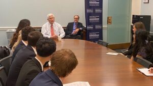 FinPolicy Trek participants speaking with Congressman Pete Sessions of Texas in the U.S. Capitol